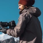 cheerful-photographer-in-outwear-337ZF9W.jpg