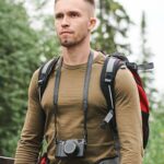 photographer-hiking-in-forest-8S26JWL.jpg